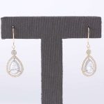 double halo design:Gorgeous 1CT Pear Cut Moissanite Drop Earrings