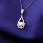 Ethereal Dewdrop: 16-Inch Pearl & Moissanite Pear Pendant Necklace
