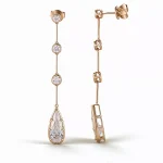 Linear Pear and Round Moissanite Drop Earrings with Bezel Accents