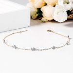Embrace the irresistible allure of love and brilliance with this captivating moissanite heart station choker bracelet. Imagine a delicate chain of shimmering gems gracing your wrist, leading the eye to a cascade of exquisite heart-shaped moissanites, each a beacon of radiant devotion and sparkling fire. This isn't just jewelry; it's a statement piece that celebrates your passionate spirit, magnetic charm, and unwavering affections.