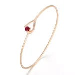 Modern Gold Bangle Bracelet Featuring Round Cut Lab Gemstone Solitaire
