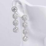 round moissanite halo linear earrings