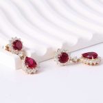 Stunning Yellow Gold Round and Pear Cut Red Lab Gemstone Drop Earrings
