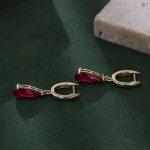 Captivating Yellow Gold Pear Cut Red Lab Gemstone Drop Earrings