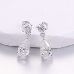 Two Stone:White Gold Round Cut and Pear Cut Moissanite Drop Earrings