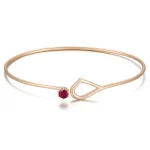 Modern Gold Bangle Bracelet Featuring Round Cut Lab Gemstone Solitaire