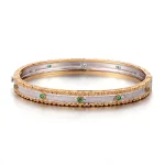 Dual-Tone Emerald Bracelet | Round-Cut Emeralds in 18K Yellow & White Gold​