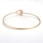Modern Gold Bangle Bracelet Featuring Round Cut Lab Gemstone Solitaire
