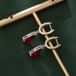 Captivating Yellow Gold Pear Cut Red Lab Gemstone Drop Earrings