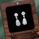 Two Stone:White Gold Round Cut and Pear Cut Moissanite Drop Earrings