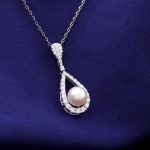 Ethereal Dewdrop: 16-Inch Pearl & Moissanite Pear Pendant Necklace
