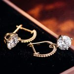 Glamorous Yellow Gold Round Cut Moissanite Drop Earrings