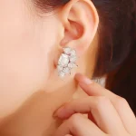 Emerald and Pear Cut Moissanite Cluster Stud Earrings with Modern Design