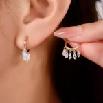 Pear-shaped Tassel Earrings | Pear-Cut Lab Diamond Tassel Hoops in 18K Yellow Gold