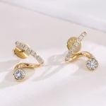 Modern Round Cut Moissanite Curved Stud Earrings with Pave Accents
