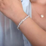 Pear Cut and Round Cut Moissanite Bracelet with Sparkling Multi-Shape Cluster Design