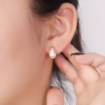 Modern Bezel Set Pear Cut Moissanite Huggie Hoop Earrings