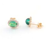 Stunning Yellow Gold Oval Cut Colombia Colored Lab Gemstone Stud Earrings