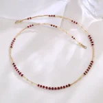 Crimson Fire-Weave Necklace | 18K Yellow Gold Bamboo Link Necklace with Natural Ruby Accents