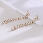 Twin Elegant Dangle Earrings | Round-Cut Lab Diamond Dangle Earrings in 18K Yellow Gold