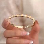 Step Harmony Bangle | 18K Yellow Gold Bangle with Rhythmic Lab Diamond Accents