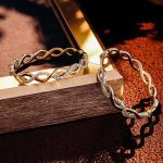 Gorgeous Yellow Gold Moissanite Twisted Hoop Earrings