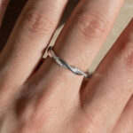 S925 Maxine Moissanite Twist Eternity Wedding Band In Sterling Silver