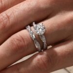 S925 Moissanite Twist 1.0Ct Round Cut 2PC Engagement Ring with 0.22Ct Round Cut Wedding Band