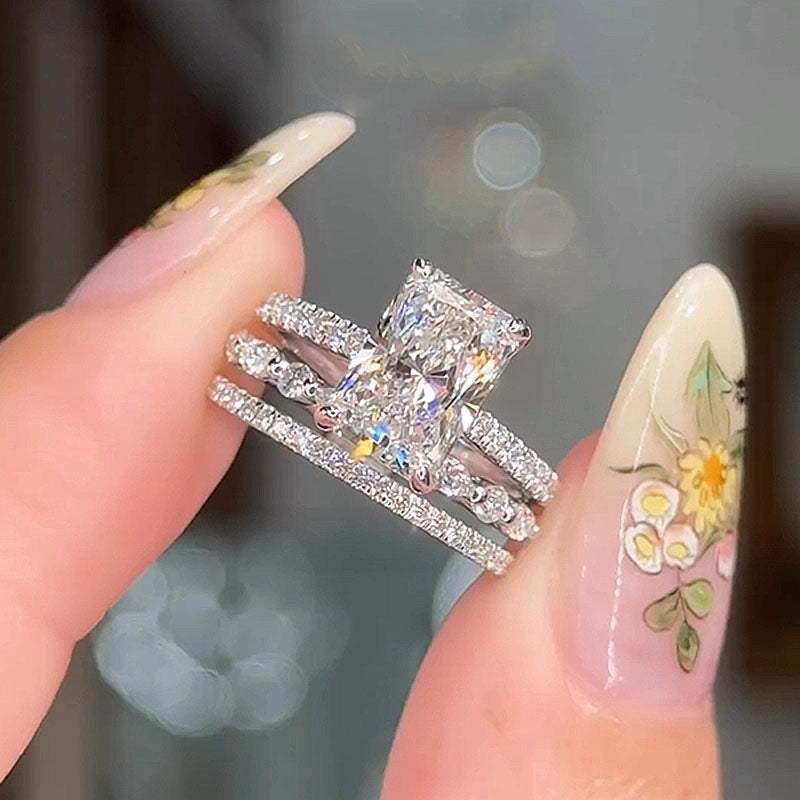 BS933S-1 S925 3PC Wedding Set Elegant 3.5 Carat Radiant Cut Simulated Diamond Engagement Ring with Round & Marquise Accents Bands - Image 1
