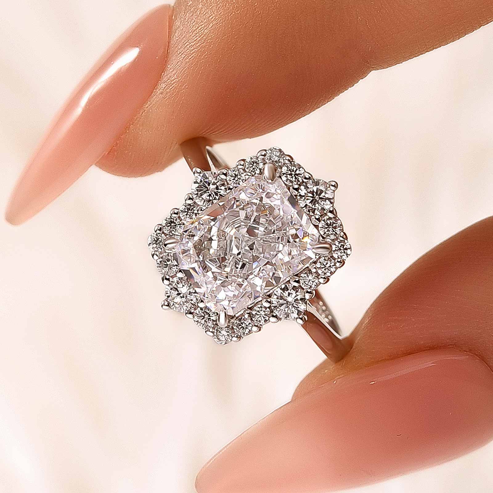 DSC-1333 S925 Stunning Halo Radiant Cut Simulated Diamond Engagement Ring In Sterling Silver - Image 1
