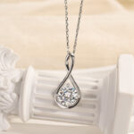 S925 Moissanite Elegant Twist Round Cut Pendant Necklace In Sterling Silver
