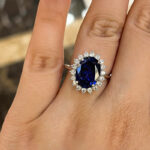 S925 Luxurious Halo Oval Cut Blue Sapphire Engagement Ring In Sterling Silver