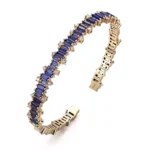 Baguettes Cut Lab Sapphire Bangle Bracelet with Shimmering Round Moissanite Accent