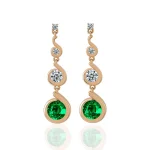 Round Emerald and Moissanite Graduated Swirl Drop Earrings