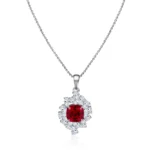 5.5ctw Cushion Cut Lab Ruby Pendant Featuring A Cluster Of Pear Cut Moissanite (pendant only)