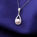 *Ethereal Dewdrop: 16-Inch Pearl & Moissanite Pear Pendant Necklace - Image 6