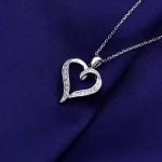 Romantic Heart Shaped Pendant Featuring Round Cut Moissanite Stones