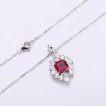 5.5ctw Cushion Cut Lab Ruby Pendant Featuring A Cluster Of Pear Cut Moissanite (pendant only) - Image 2