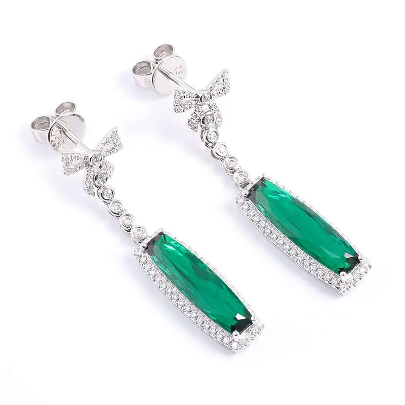 5-7 Emerald and moissanite Bow Drop Earrings - Image 1