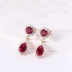 **Stunning Yellow Gold Round and Pear Cut Red Lab Gemstone Drop Earrings - Image 2