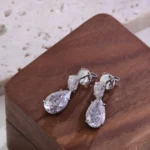 **Captivating Pear Cut White Gold Drop Earrings - Image 3