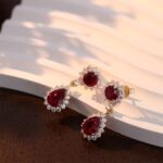 **Stunning Yellow Gold Round and Pear Cut Red Lab Gemstone Drop Earrings - Image 5