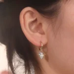 Pear Cut Moissanite Drop Earrings with Elegant Polished Gold Hoops - Image 4