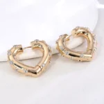 Heart Shaped Hoop Earring with Shimmering Round Cut Moissanite Accent - Image 5