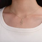 Geometric S Shaped Pendant Necklace Featuring Tapered Baguette Cut Moissanite Accents (pendant only) - Image 4