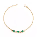 Delicate Oval Emerald and Diamond Station Bracelet in 18k Yellow Gold