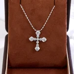 Art Deco Baguette and Round Diamond Cross Pendant in 18k White Gold