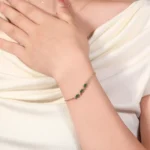 Delicate Oval Emerald and Diamond Station Bracelet in 18k Yellow Gold - Image 4