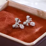 Pavé Lab Diamond Bow Drop Earrings with Oval Cut Dangle