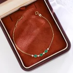 Delicate Oval Emerald and Diamond Station Bracelet in 18k Yellow Gold